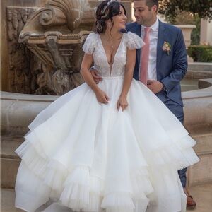 Elegant White Wedding Gown with Ruffled Skirt - RITA VINIERIS